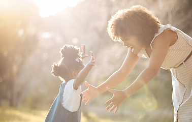 Image showing Excited mother, kid and hug at park for love, care and bonding for trust, support and funny laugh outdoor. Happy mom, girl child and embrace in nature for interracial relationship of family together