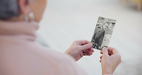 Image showing Memory, senior and woman with a photograph with hands in closeup for nostalgia in home. History, retirement and elderly person with retro photography to remember a child with memories or grandmother.