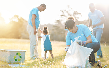 Image showing Nature recycling, community volunteer and people cleaning garbage pollution, waste and team environment care. Teamwork, NGO support and eco group helping with park clean up, outreach project or trash