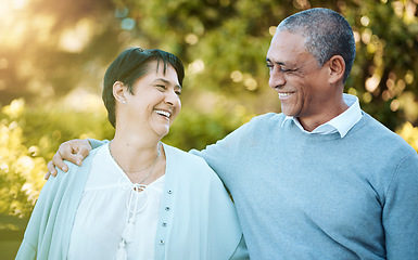 Image showing Love, smile and senior couple in park laughing for comic, comedy or funny joke in conversation. Happy, nature and elderly man and woman in retirement talking, bonding and having fun together in field