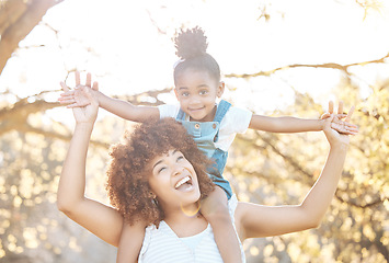 Image showing Airplane, love and mother with girl child in a park happy, freedom and adventure in nature together. Flying, piggyback and kid with mom in a forest for games, travel or explore with care and support