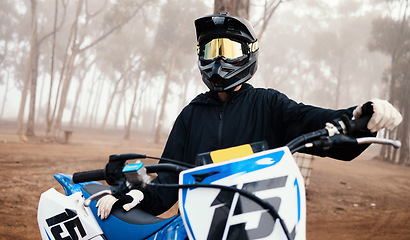 Image showing Motorcycle, person and sport in forest with training for competition, ride in nature with action and helmet. Extreme, adrenaline and exercise, athlete and transport with dirt bike, freedom and travel