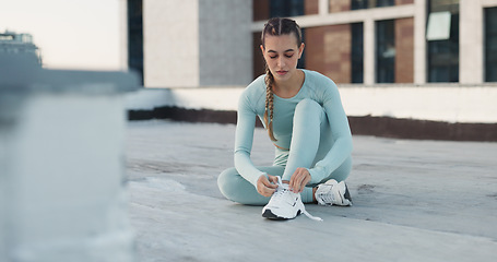 Image showing Fitness woman, floor or tie shoes lace, sneakers and start exercise, training challenge or race workout, practice or activity. Athlete footwear, sportswear or urban person prepare for sports wellness