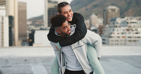 Image showing Fitness, piggyback and couple in a city with love, hug and bind in training or cardio routine. Sports, love and man with woman outdoor for workout, challenge or exercise, happy and embrace in town