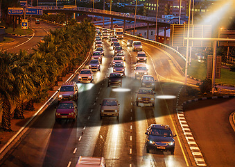 Image showing Ufo, spaceship light and traffic in city at night for alien mission, science fiction and fantasy in sky with surreal glow. Spacecraft, mystery and flying saucer from outer space for discovery