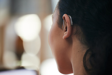 Image showing Hearing aid, closeup and deaf ear with sound and person with a disability for helping with audio and medical implant. Technology, patient and problem with listening support and wellness with back