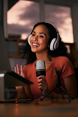 Image showing Woman, headphones and microphone, radio DJ or podcast with journalist and live media broadcast at night. Happy, tech and multimedia, communication and social media streamer with content creation