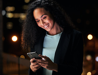 Image showing Phone, rooftop and happy business woman typing internet search, scroll on website or contact social media user. Happiness, urban city and night person check cellphone app, feedback and reading email