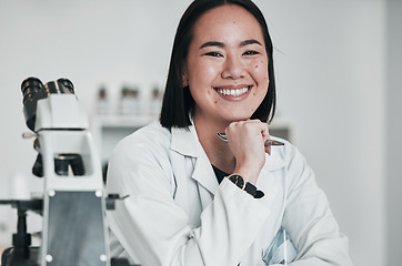 Image showing Science, microscope and portrait of Asian woman in laboratory for research, analysis and study. Biotechnology, healthcare and happy scientist with equipment for medical innovation, sample and test