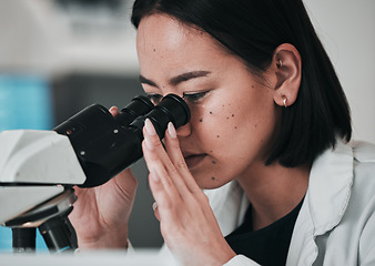 Image showing Science, microscope and Asian woman in laboratory for sample, data analysis and study. Biotechnology, healthcare and scientist looking in equipment for medical innovation, research and DNA testing