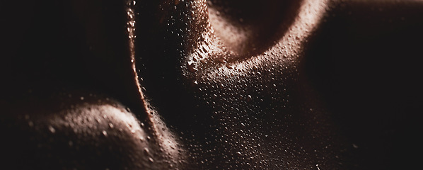 Image showing Body, water drops or skin and texture of a person for dermatology, skincare and hygiene. Zoom on aesthetic model for art deco, silhouette and sweat with droplets, creative and dark background