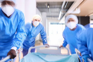 Image showing Emergency, hospital bed and surgeon team, healthcare staff or group running for surgery, clinic services or medical help. Injury collaboration, fast motion blur or doctors rush for accident first aid