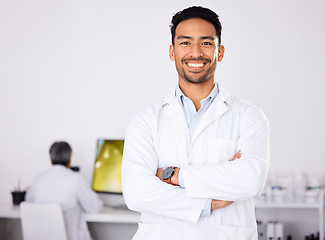 Image showing Portrait, medical and man with arms crossed, research and expert in a laboratory, chemistry and smile. Face, scientist or researcher in a lab coat, healthcare professional and confident with a career