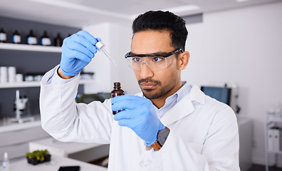 Image showing Scientist, man and bottle, pipette and chemical solution with medical research, investigation and goggles for safety. Chemistry, liquid and science in laboratory, future and biotechnology with study