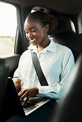 Image showing Laptop, smile and black woman typing in car to travel, reading email for remote work and social media. Computer, taxi and happy African person on business trip, journey and commute in transportation