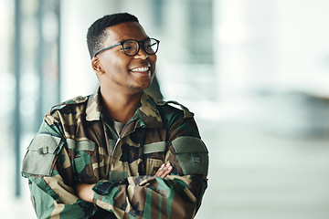 Image showing Soldier with smile, confidence and arms crossed at army building, pride and happy professional in sevice. Military career, security and courage, black man in camouflage uniform at government agency.