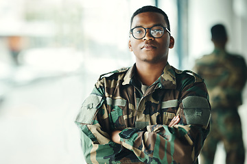 Image showing Confident soldier portrait, mockup and arms crossed in army building, pride and professional hero service. Military career, security and courage, black man in camouflage uniform at government agency.