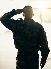 Image showing Confident soldier portrait, army and salute in building with pride, professional hero and night service. Military career, security and courage, black man in camouflage uniform at government agency.