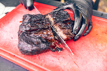 Image showing Cutting delicious roast beef meat