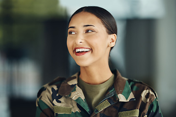 Image showing Happy woman soldier with confidence, camouflage and pride, relax outside army building. Professional military career, security and courage, girl in uniform and smile at government agency service.