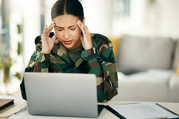 Image showing Headache, stress or woman soldier with trauma and depression at desk with anxiety on laptop. Frustrated, psychology or sad person with army memory, military frustration or ptsd crisis typing online