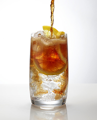 Image showing cola pouring into cocktail glass