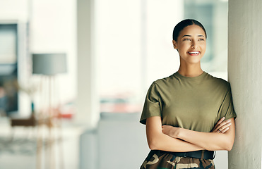 Image showing Woman soldier with smile, arms crossed and pride, relax at army building with confidence. Professional military career, security and courage, girl in uniform at government agency in hero service.