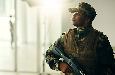 Image showing Thinking, soldier and black man with gun in army, vision and serious in security. Military veteran, rifle and weapon of African professional with idea in camouflage uniform at government agency.