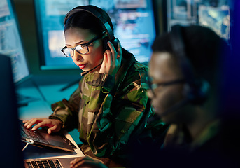 Image showing Military control room, headset and woman with communication, computer and technology. Security, global surveillance and soldier with teamwork in army office at government cyber data command center.