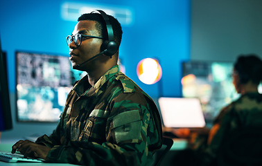 Image showing Army, control room and man on computer in office, data center and monitor for technical support, cybersecurity or surveillance. Military, officer or work in tech, security or government communication