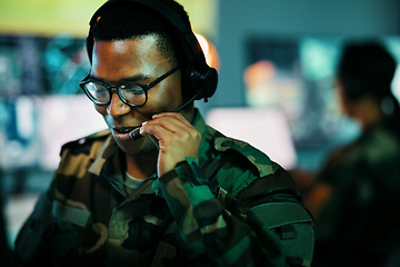 Image showing Control room man, surveillance and military communication, army risk dispatch or security telecom advice. Headset, 911 emergency consultation and African soldier consulting on intel support service