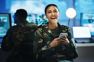 Image showing Portrait, phone and woman in a military control room for strategy as a soldier in uniform during war or battle. Mobile, happy and a young army person in an office for support, surveillance or service