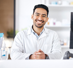 Image showing Man, pharmacy and portrait with happy and smile of pharmacist ready for healthcare support and work. Clinic, doctor and male professional with career confidence and medicine for medical job at desk