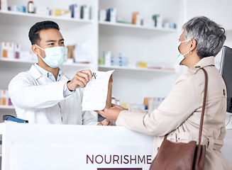 Image showing Pharmacist, package and customer in face mask for healthcare support, service and virus compliance in store. Medical doctor and sick patient with paper bag, covid medicine and pharmacy or clinic desk