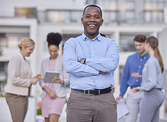 Image showing Black man, portrait and hands crossed for leadership and teamwork outside office building with collaboration. Business, people and professional employee in human resources and corporate startup