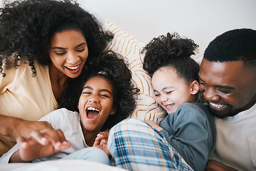 Image showing Mom, dad and children in bed with tickling, comic joke and laugh with bonding, care and love in family home. Black man, mother and daughter with smile, play game or crazy in bedroom, morning or house