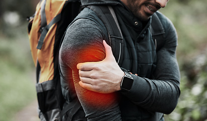 Image showing Closeup, outdoor and man with shoulder pain, fitness and inflammation with exercise, hiking or wellness. Person, hiker or athlete holding arm, bruise or muscle tension with nature, workout or injury