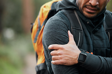 Image showing Shoulder pain, injury and person hands with fitness, workout and travel accident from hike. Athlete, arm bruise and fail from trekking in the woods on a trail with muscle strain and backpack