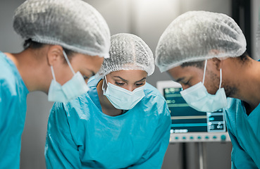 Image showing Healthcare, medicine and team of doctors in surgery with equipment, cooperation and support in hospital. Nurses helping medical surgeon, professional safety and operation in emergency procedure in ER