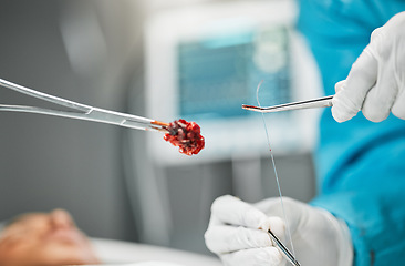 Image showing Surgery, doctors hands on tools and stitches with equipment, teamwork and support in hospital. Nurse helping medical surgeon, blood and patient in bed for safety, operation and emergency care in ER.