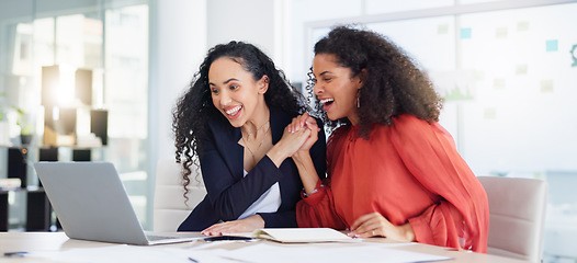 Image showing Laptop, success and business women high five to celebrate goals, targets or achievement in office. Winner, wow surprise and happy friends or employees in celebration of winning, promotion and bonus.