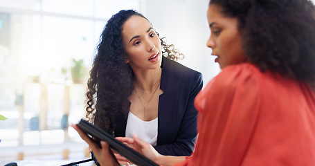 Image showing Teamwork, tablet and business women in office helping coworker with project. Coaching, collaboration and intern in training talking to mentor with touchscreen technology for learning in company.