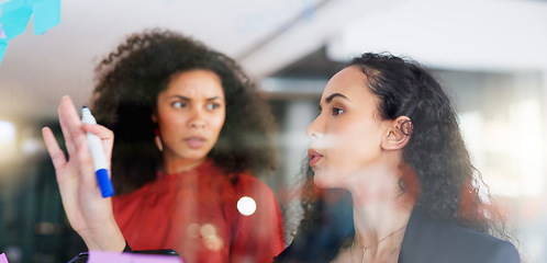 Image showing Planning, strategy and business women on glass board teamwork, collaboration and creative ideas for project. Biracial people or staff for workflow management, schedule or planner on window reflection