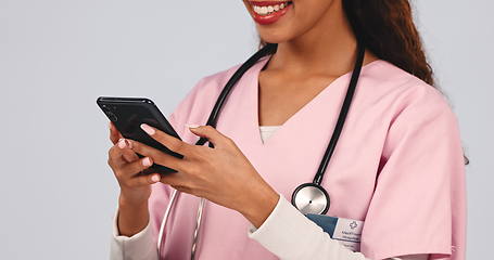 Image showing Nurse hands, phone and healthcare communication, social media meme and funny chat or clinic contact in studio. Medical woman, worker or doctor on mobile telehealth and typing on a white background