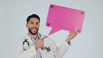 Image showing Man, doctor and speech bubble mockup, presentation or healthcare chat, FAQ and health advice in studio. Face, quote and medical worker pointing to poster ideas and tracking marker on white background