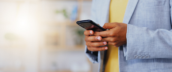 Image showing Business, man and hands typing on smartphone in office, online user and contact technology. Closeup of employee texting on cellphone for networking, mobile app notification or social media connection