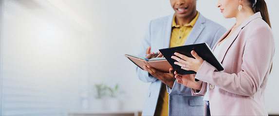 Image showing Tablet, notebook and business people in discussion in the office doing research for a project. Collaboration, teamwork and corporate team working on a report together with mobile device in workplace.