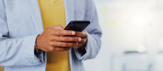 Image showing Closeup, man and hands with smartphone in office for online user, contact and reading professional chat. Employee typing on cellphone for networking, mobile app or scroll to social media notification