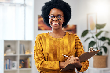 Image showing Portrait, therapist and happy black woman with checklist for counselling in office. Face smile, psychologist in glasses and clipboard for therapy session, psychology counsellor or professional doctor