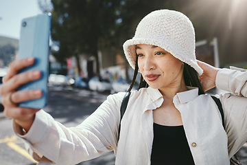 Image showing Happy woman on street with selfie in city, travel holiday memory for social media and streetwear. Influencer, streamer or gen z girl with urban fashion, photography and smile for content creation.